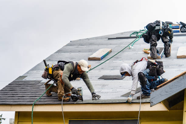 Professional Gutter Installation technician working in Sandisfield, MA